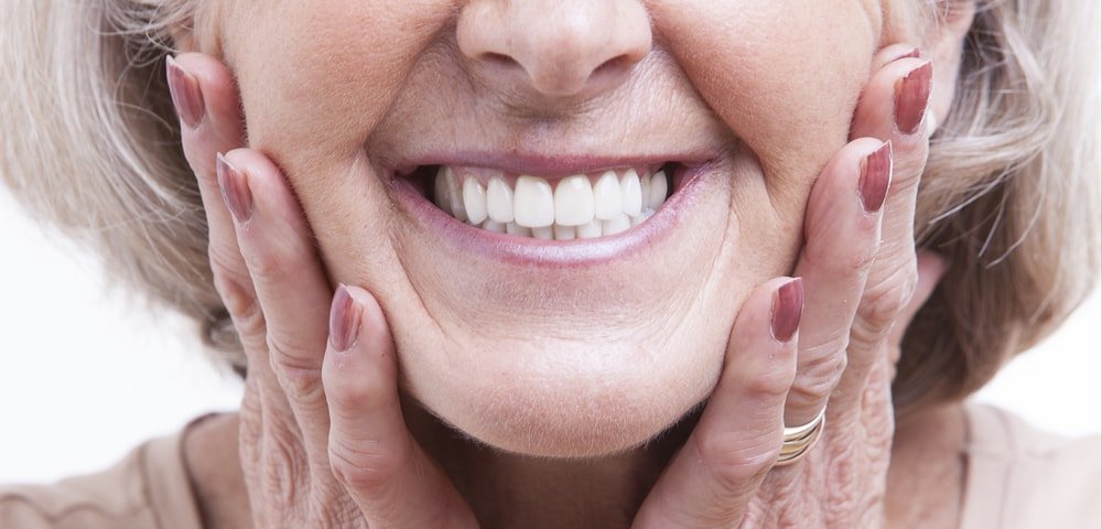 Elderly woman with dentures